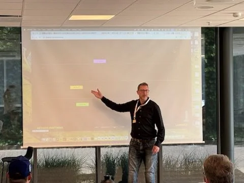 Michael Weng presenting Labshock to the room at BSides Aarhus 2025